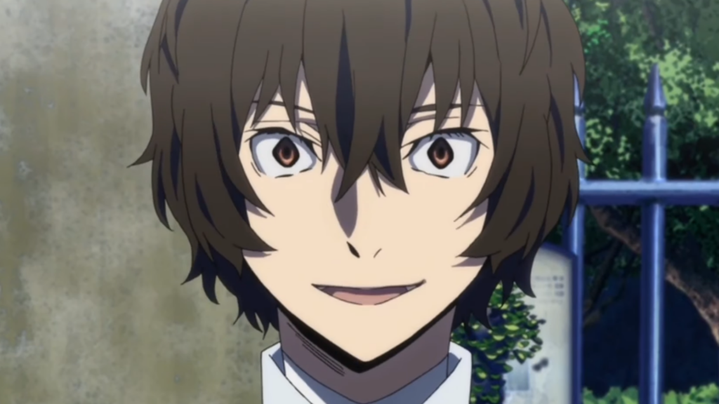 Dazai mở to mắt và trông như một kẻ tâm thần trong Bungo Stray Dogs
